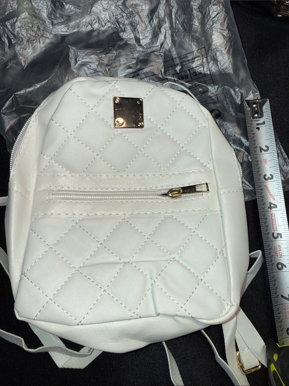 White Quilted Mini Backpack with Gold Accents